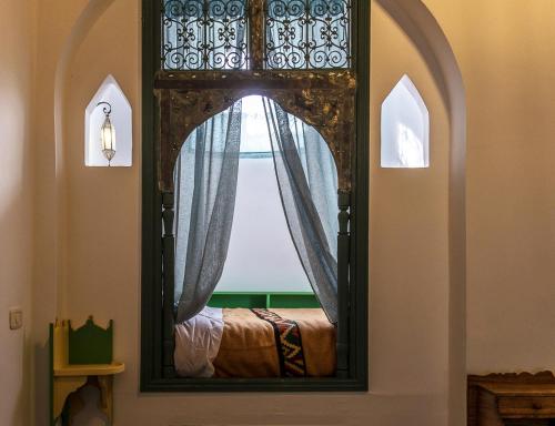 Voodi või voodid majutusasutuse Dar Baya Hotel Sfax toas