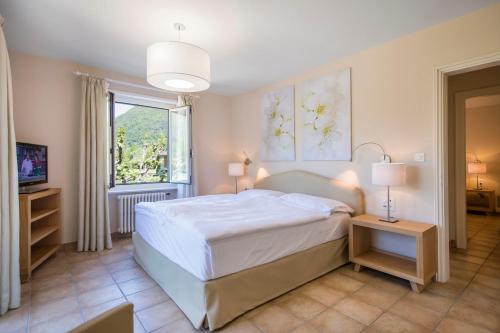 Postel nebo postele na pokoji v ubytování Villa Delta Suites House