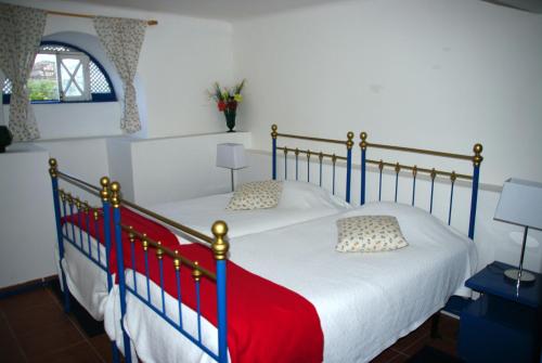 Postel nebo postele na pokoji v ubytování Tapada Flats