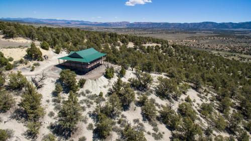an aerial view of a building in the middle of a forest at Ridgetop Hideaway in Hatch