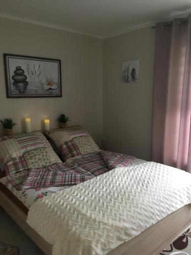 Katil atau katil-katil dalam bilik di Apartament Deluxe