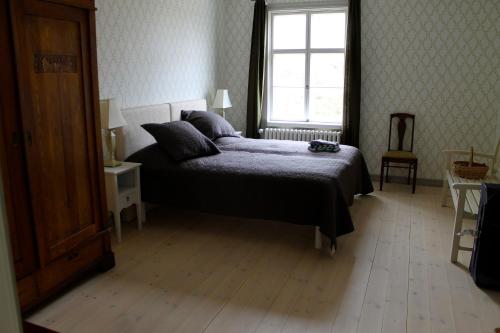 Llit o llits en una habitació de Vestlax Mellangård