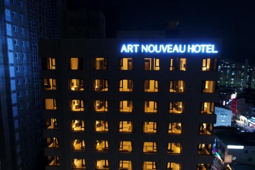 a view of the art novo hotel at night at Geoje Artnouveau Suite Hotel in Geoje 