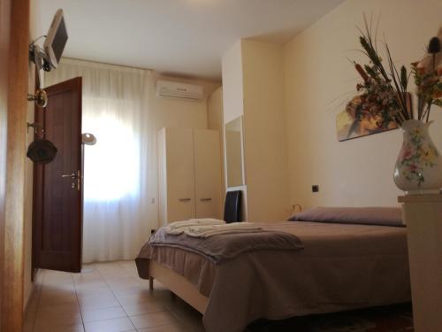 Llit o llits en una habitació de Il Pentagono