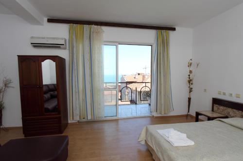 Postel nebo postele na pokoji v ubytování Family Hotel Verona