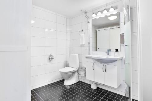 Koupelna v ubytování Hotel Poseidon