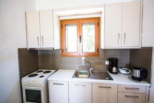 Una cocina o zona de cocina en Bay View Apartments