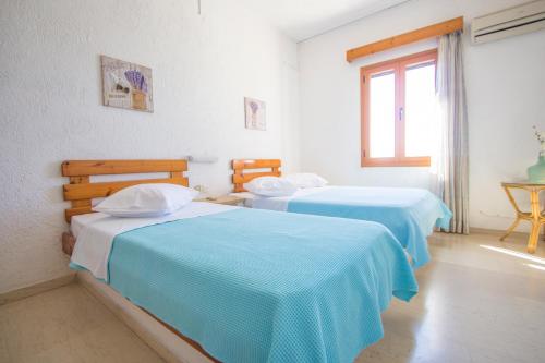 Cama o camas de una habitación en Bay View Apartments
