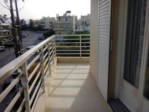 
A balcony or terrace at Pasiphae Heraklion Hotel
