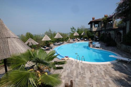 an image of a swimming pool at a resort at Cascina Bricco in Ovada