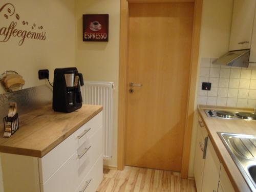 Kuchyň nebo kuchyňský kout v ubytování Gästehaus Nelles