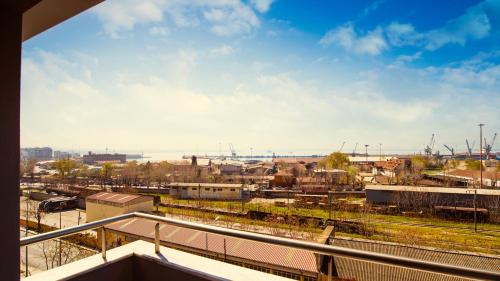 a view of a city from a balcony at White Luxury in Thessaloniki