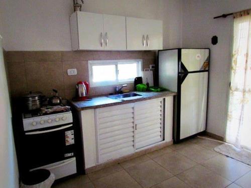 Dapur atau dapur kecil di Cabañas Punta Fabiana