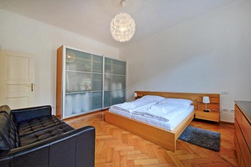 Postel nebo postele na pokoji v ubytování Vincent Apartment