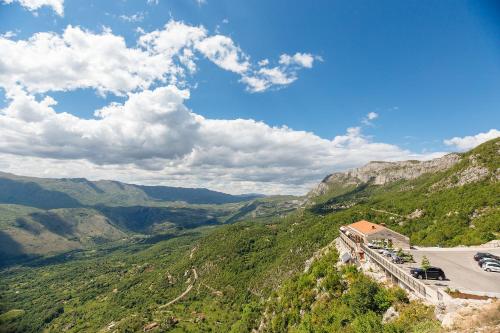 a view of a winding road on a mountain at Hotel Sokoline in Danilovgrad