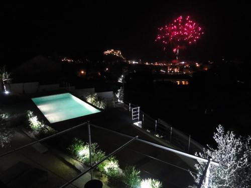a firework display in the sky at night at Home Cassis - Maison Méditerranée - Piscine chauffée à 30c in Cassis