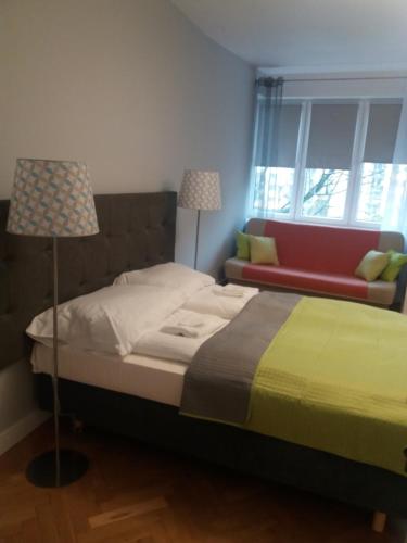 Apartament Miro tesisinde bir odada yatak veya yataklar