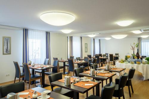 En restaurant eller et andet spisested på BusinessHotel Schramberg