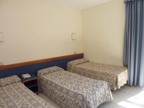 - une chambre avec 2 lits dans l'établissement Roma Reial, à Barcelone
