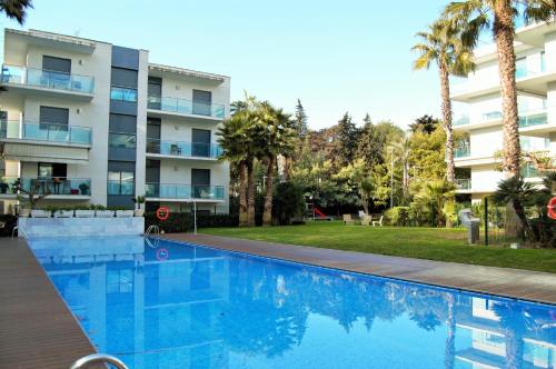 Bazén v ubytovaní Apartamento Ainara Garden Family alebo v jeho blízkosti