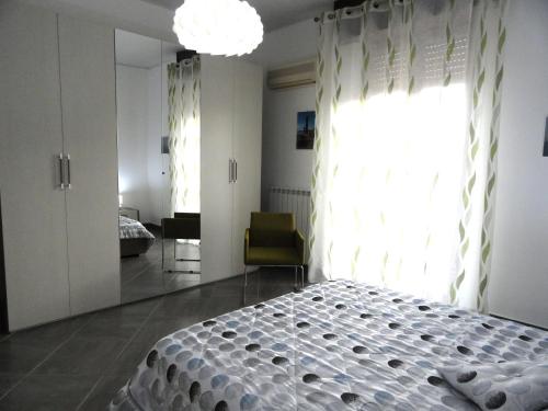 Ein Bett oder Betten in einem Zimmer der Unterkunft Appartamento Celeste