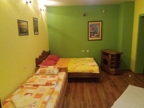 Postel nebo postele na pokoji v ubytování Guest House Majstorovic