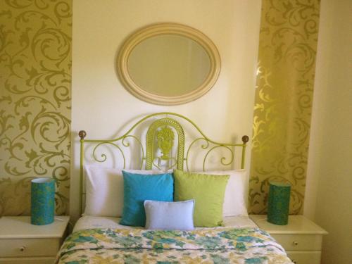 Кровать или кровати в номере Casa do Cabo de Santa Maria