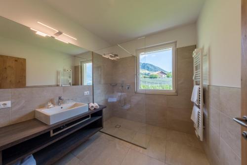 Koupelna v ubytování Hotel Garni Herz