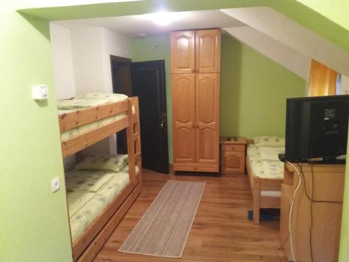 Postel nebo postele na pokoji v ubytování Guest House Majstorovic