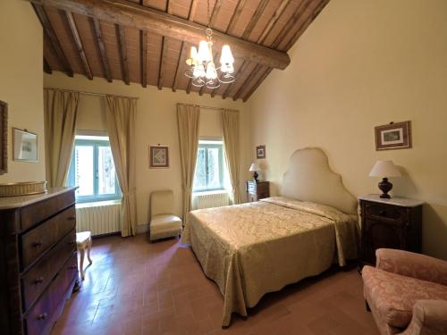 Villa di Catarsena tesisinde bir odada yatak veya yataklar