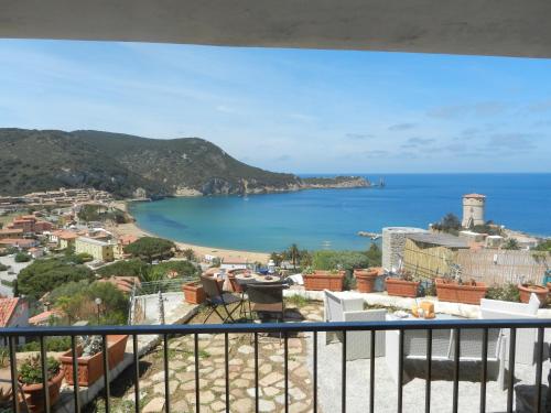 a view of a beach from a balcony at Villa Giglio Rosso in Campese