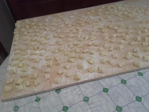 a cutting board with some food on top of it at Agriturismo da Remo in Magliano in Toscana
