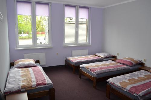 Postel nebo postele na pokoji v ubytování Hostel Mikołajczyka59