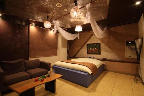 Giường trong phòng chung tại Dai Tokyo (Adult Only)