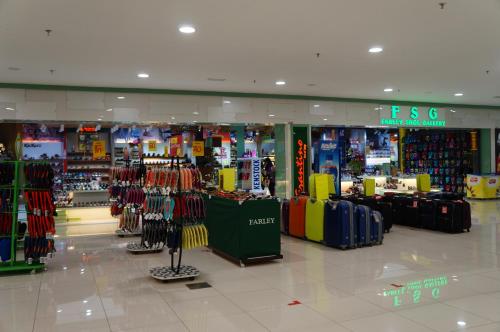 a store filled with lots of different types of luggage at Greens Hotel & Suites in Bintulu