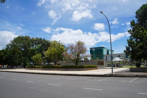 a street light on the side of a road at Greens Hotel & Suites in Bintulu
