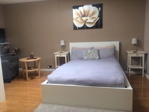 Katil atau katil-katil dalam bilik di Studio Apartments Camden Town