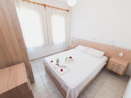 Giường trong phòng chung tại Beyaz Villas