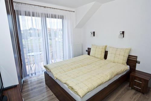 En eller flere senge i et værelse på Villa Vista
