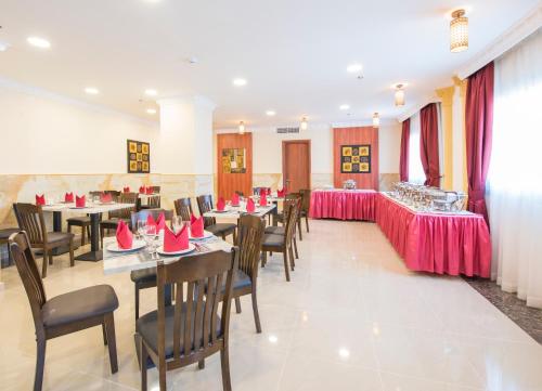 Royal Tulip Hotel LLC Image