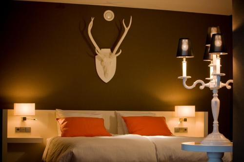 Letto o letti in una camera di Van der Valk Hotel Apeldoorn - de Cantharel