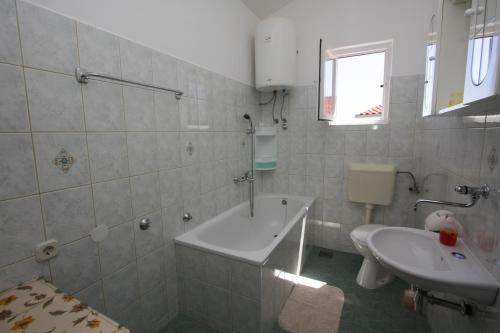 Kúpeľňa v ubytovaní Apartments Jolanda