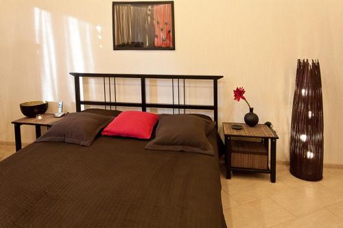 Cama o camas de una habitación en Cozy and Comfortable Apartment in the Centre