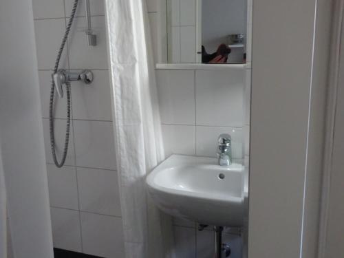 Ванна кімната в City Appartement