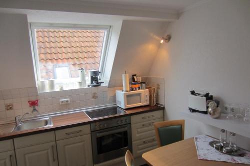 Kuchyň nebo kuchyňský kout v ubytování Exklusive Ferienwohnung Strohberg