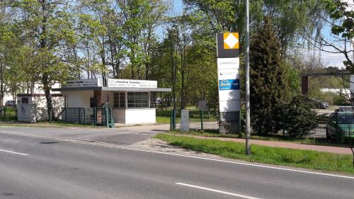 a gas station on the side of a road at Amarillo Hotel Velten in Velten
