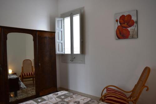 Ένα ή περισσότερα κρεβάτια σε δωμάτιο στο Casa Mazzara
