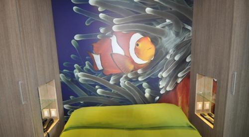 a painting of a clownfish under the ocean at Hotel Miramare in Pineto