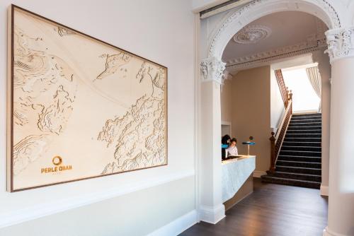 a large map hanging on a wall in a hallway at The Perle Oban Hotel & Spa in Oban