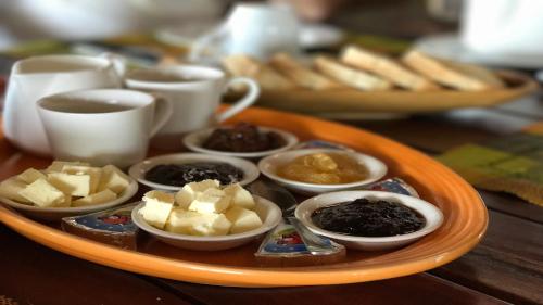 a tray of different types of desserts on a table at Laguna Blu - Resort Madagascar in Andavadoaka